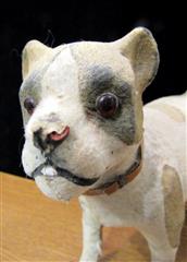 RARE ANTIQUE LATE 1800'S MOLDED CARDBOARD SPOTTED DOG W/GLASS EYES ON WHEELS